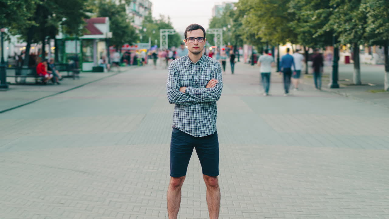 Man Standing on City Street