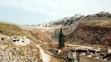 jewish and arab neighborhood split by security wall