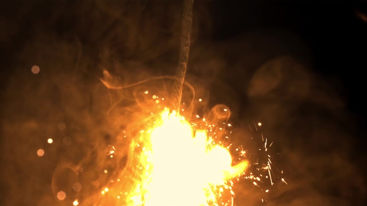 Close-up of a Burning Fuse with Bright Sparks and Smoke