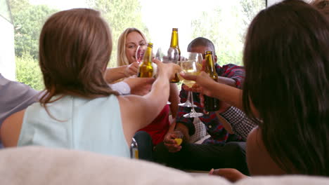 group of friends celebrating together at home shot on r3d