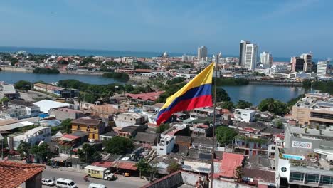 drone footage of colombian flag waiving in cartagena