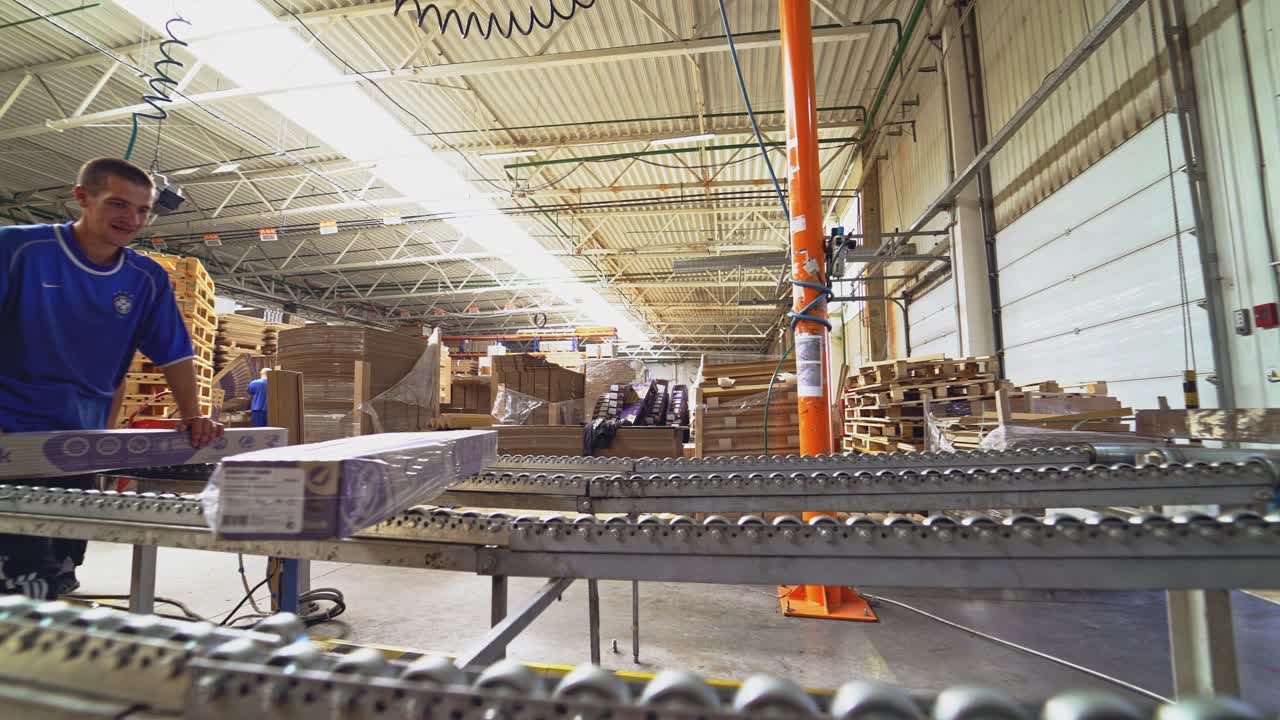 Industrial equipment for the production of laminate. Furniture factory production line.The factory for the production of laminate.