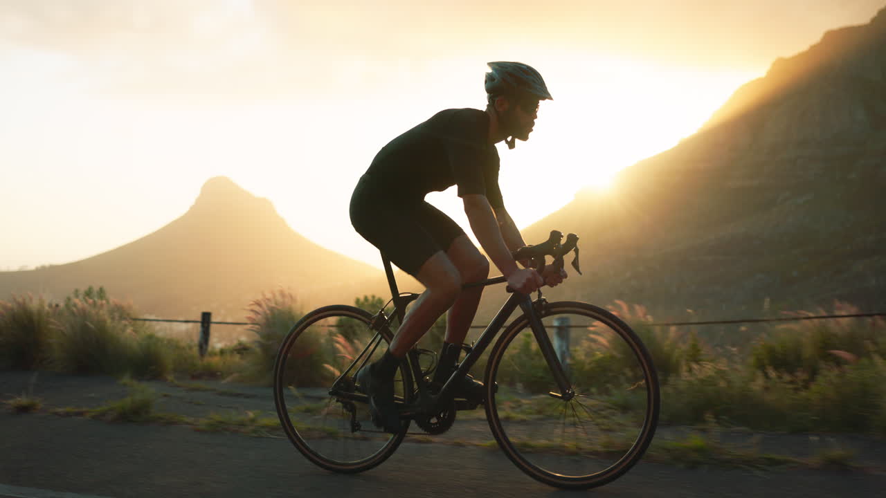 Bicycle, mountain and man cycling on road