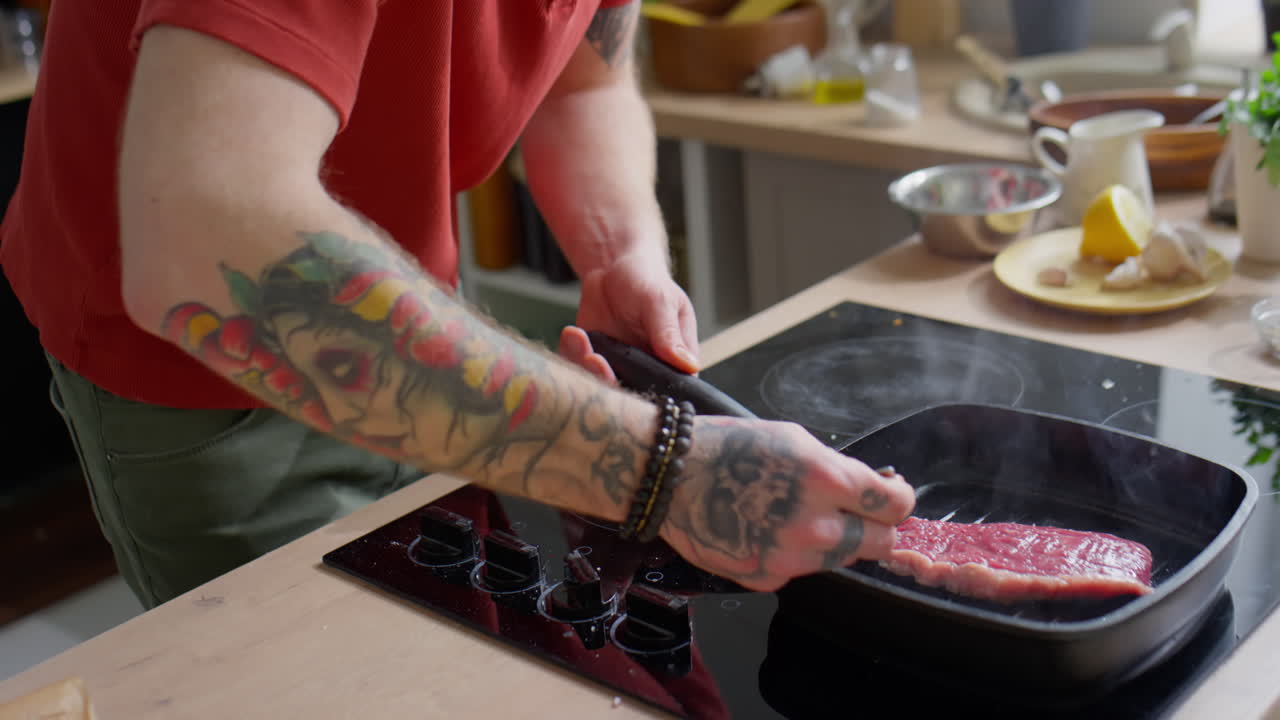 Chef Frying Beef Steak on Grill Pan