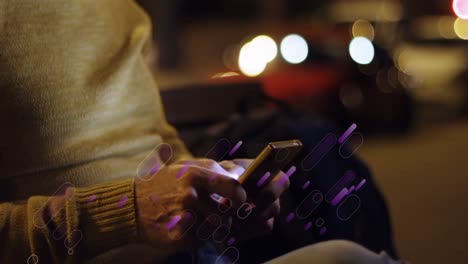 animation of purple light trails over caucasian man using smartphone