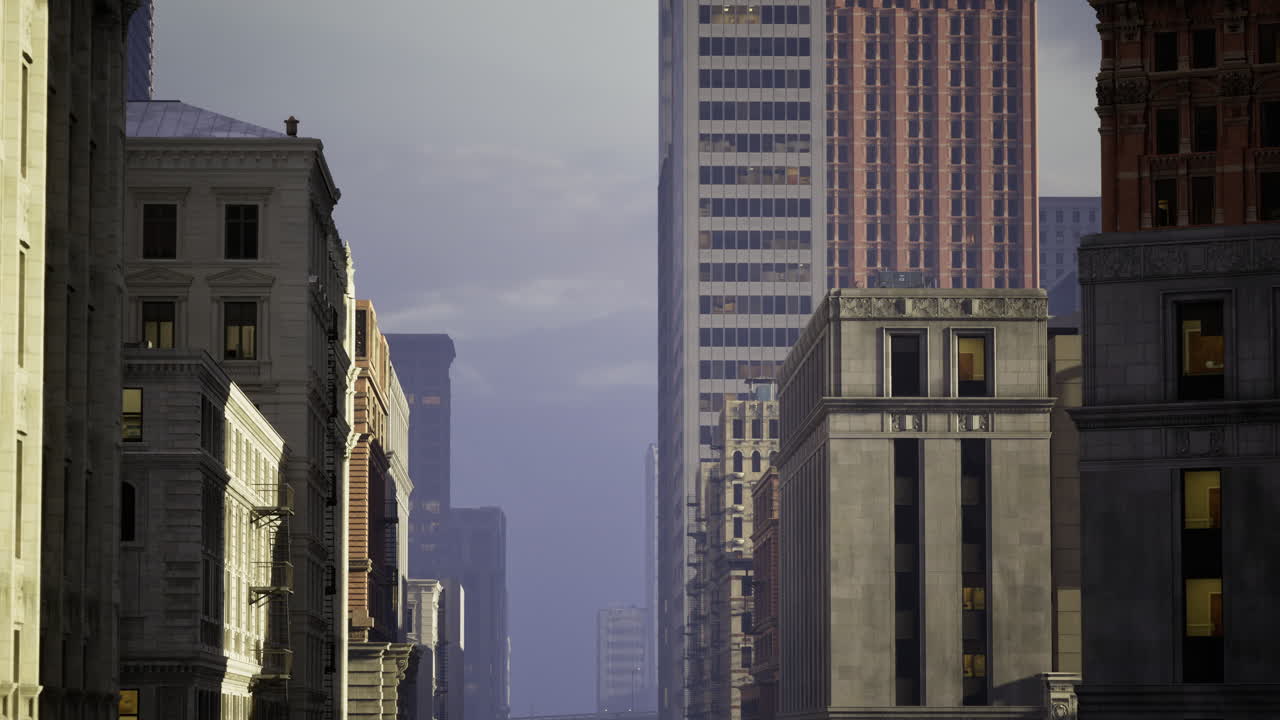City skyline during twilight with silhouettes of buildings and soft light