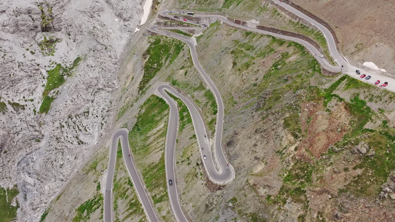 Stelvio Pass, 48 sharp bends ascend Alps, a breathtaking symbol of human mastery