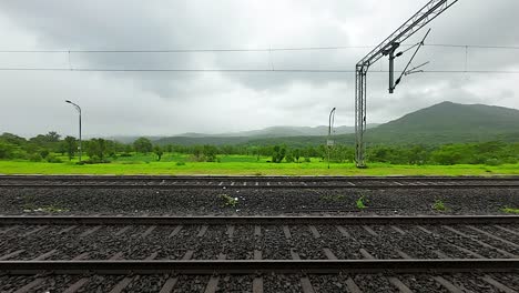greenery forest timelaps view from train window in konkan railway