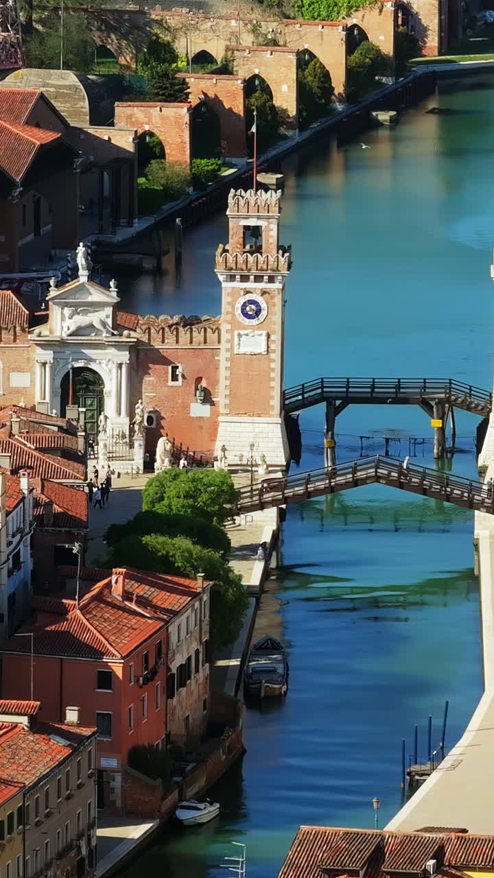 Aerial drone view of the Venetian Arsenal seen from above in Venice City. Vertical