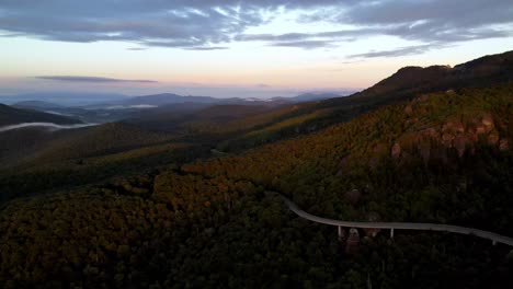 the viaduct below looking to the west at sunrise below grandfather mountain aerial