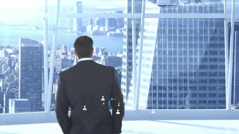 businessman in suit looking at city skyline with animation of digital network icons