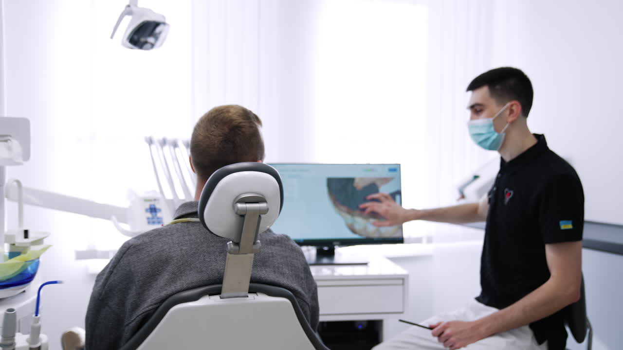 Dentist Consultation with Patient