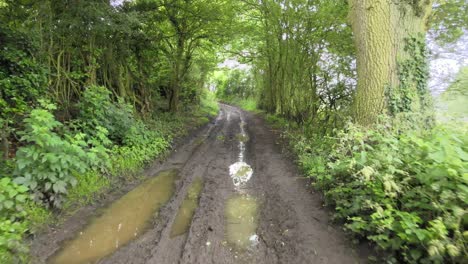 Muddy-lane-reverse-drone-footage