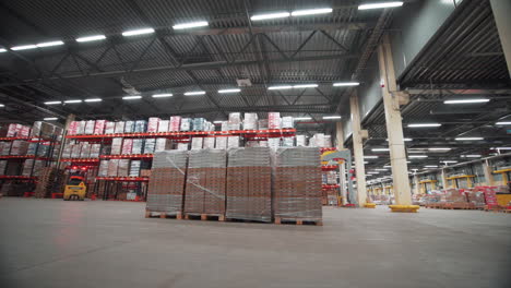 warehouse interior with forklift and product storage