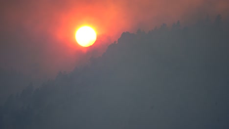 red sun during wildfire season