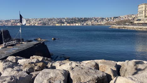 port of naples with city in background