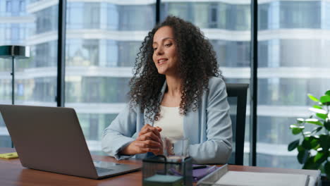 Business-consultant-greeting-clients-video-call-closeup.-Director-using-laptop