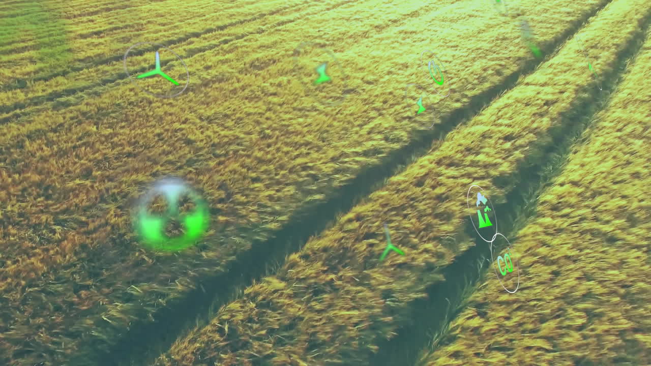 Aerial crop field showing floating green HUD icons, highlighting CO? and wind turbines in 3D render