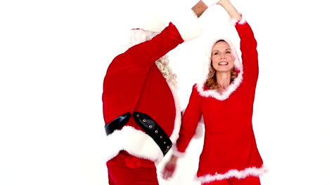 santa and mrs claus dancing together