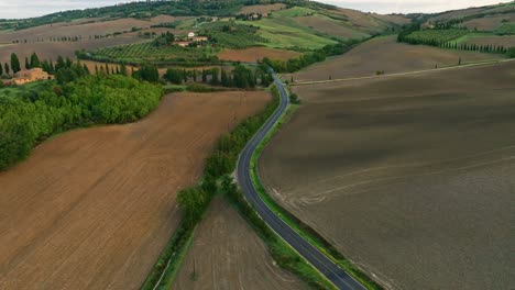 Aerial-over-the-Tuscany-landscape-near-Pienza,-Province-of-Siena,-Italy