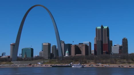 a tugboat travels on the mississippi river near st louis 1