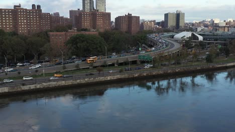 aerial-tilt-down-with-housing-project-and-traffic-on-the-Harlem-River-Drive-in-New-York-City