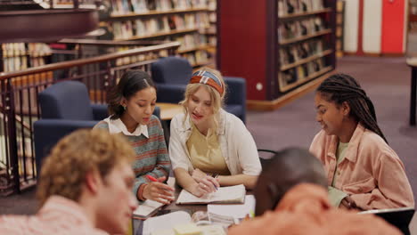 students studying together in library
