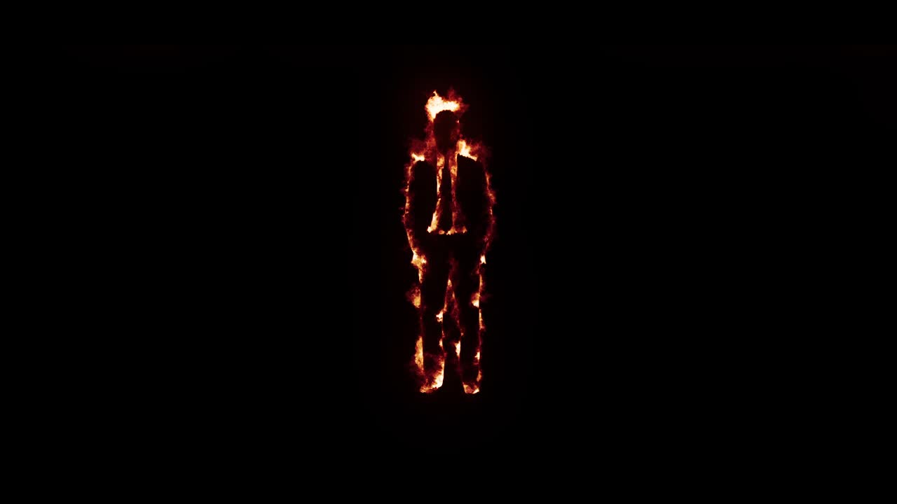 Effetto realistico di fuoco sulla silhouette di un uomo con fiamme ardenti su sfondo nero