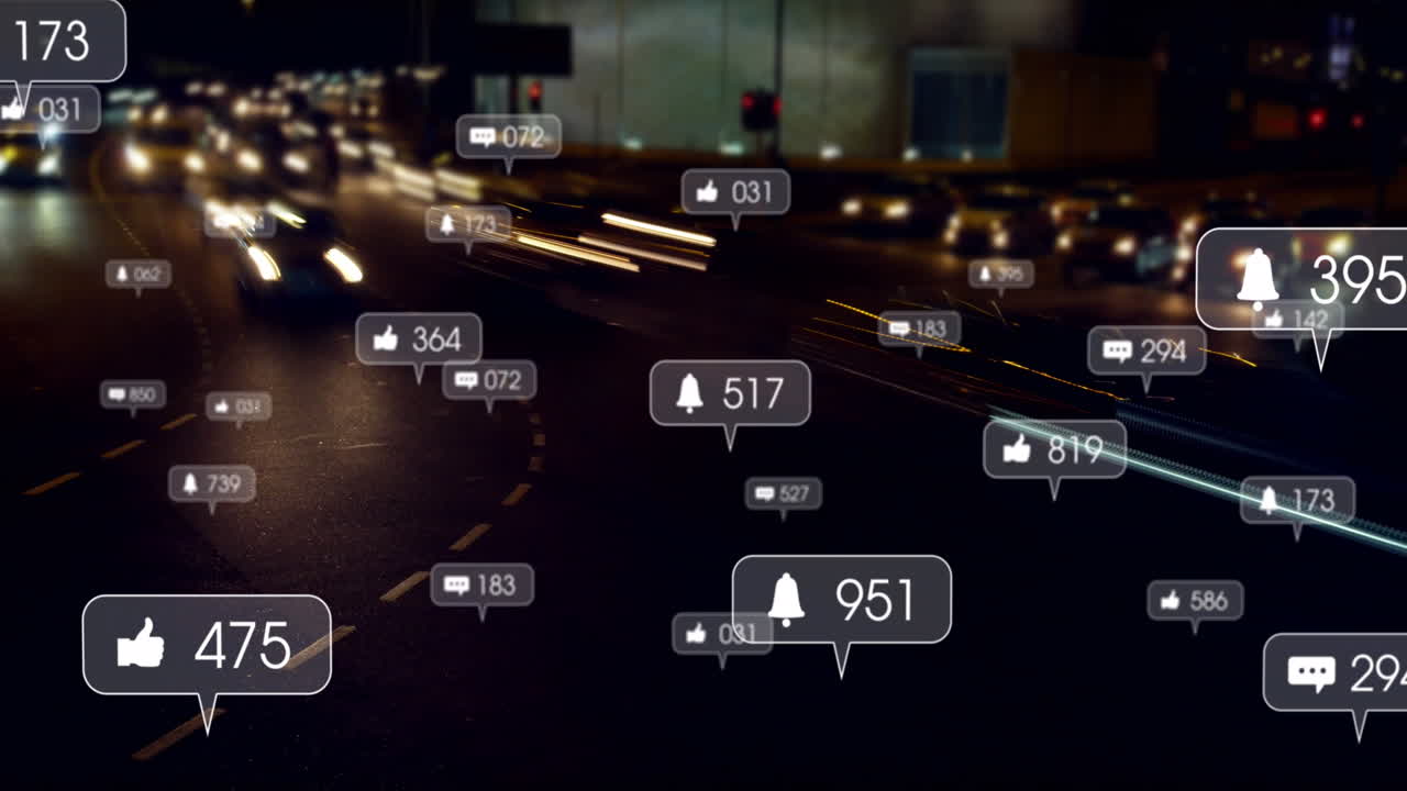 Animation of social media icons and numbers over out of focus traffic lights