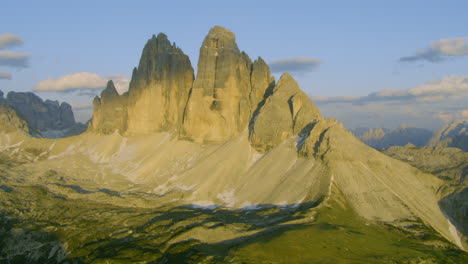 golden hour sunset on beautiful tre cimes da lavaredo mountains in italy's dolomite alps