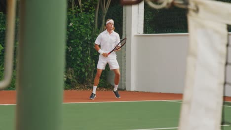 tennis players playing a point