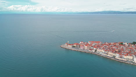 Approaching-drone-footage-of-the-cape-of-the-old-town-of-Piran-in-Slovenia