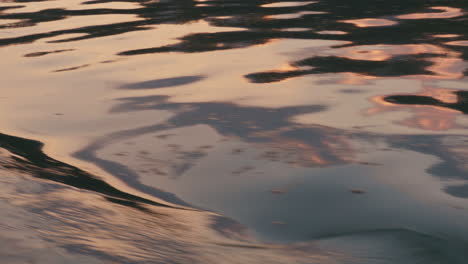 Driving-on-the-calm-sea-at-sunset