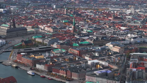 tight aerial shot over central copenhagen spires