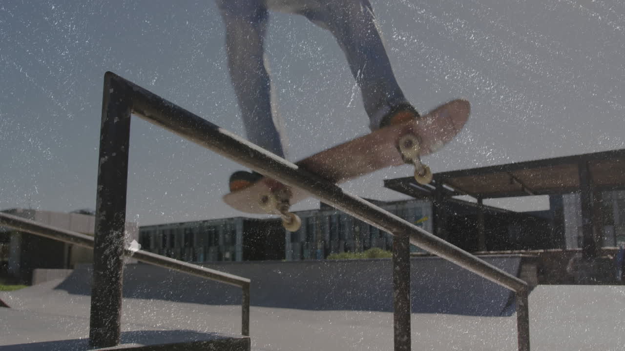 Skateboarder legs grinding metal rail in skatepark, with animated data overlay for sports marketing