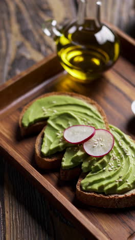 avocado toast on wooden tray