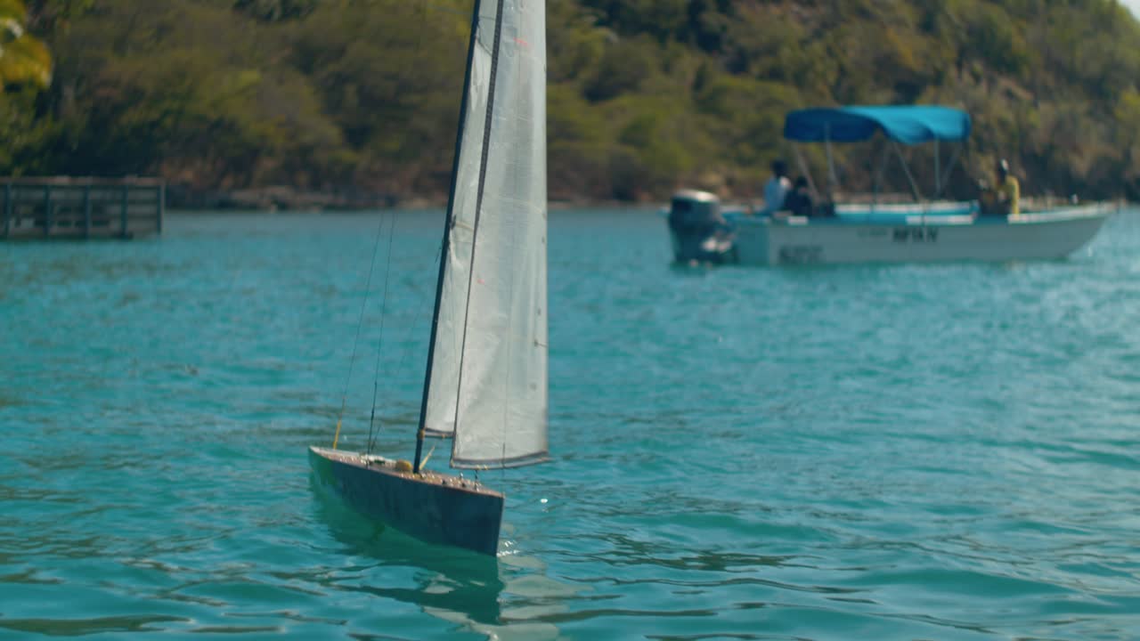 Model Sailboat Racing on the Water