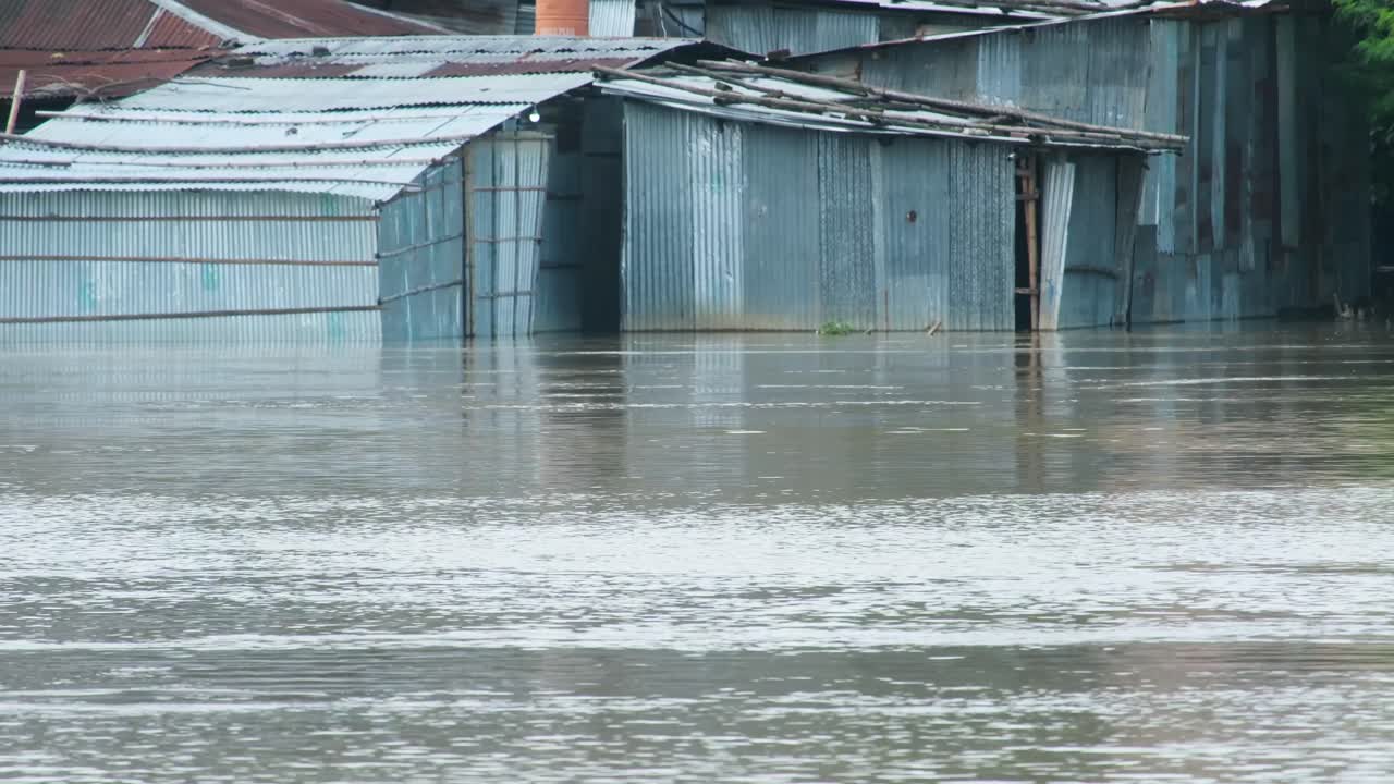 Flooded Area with Tin Sheds