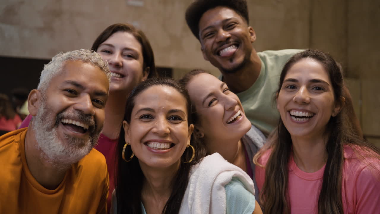Group of happy people at the gym