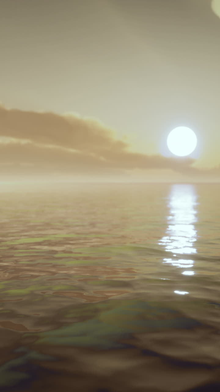 바다 위에서 조용한 해가 지는 것