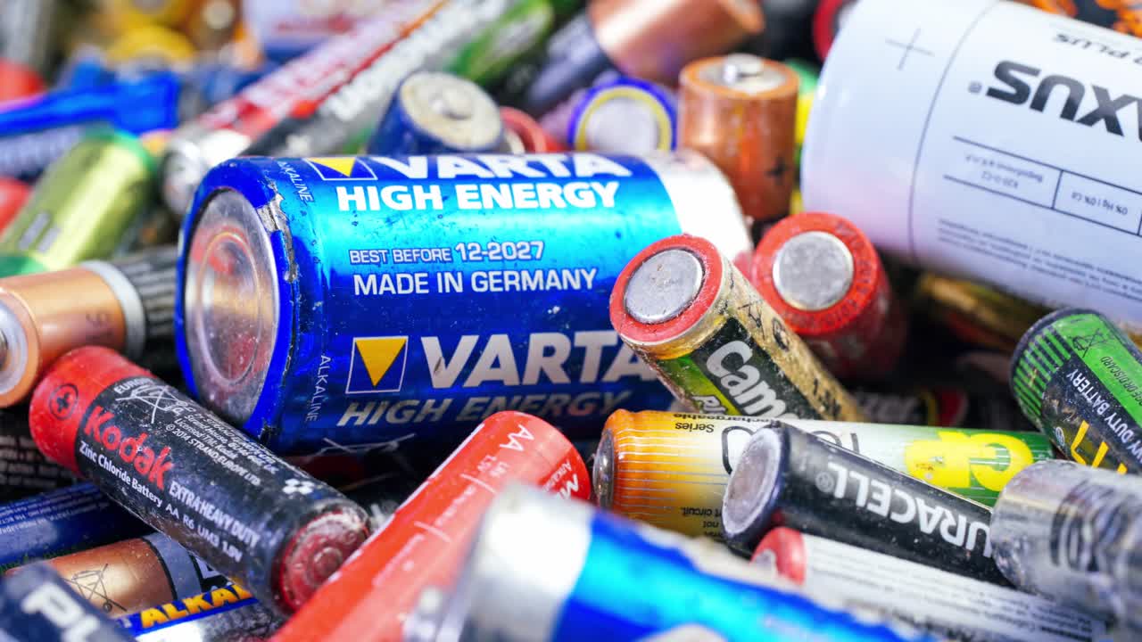 Used Alkaline Batteries. Dead Single-use Batteries before Disposal