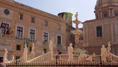 locked off view of monumental palermo praetorian fountain at syracuse, sicily