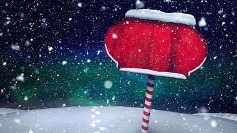 composición de video con nieve sobre escena de invierno con un signo en blanco rojo