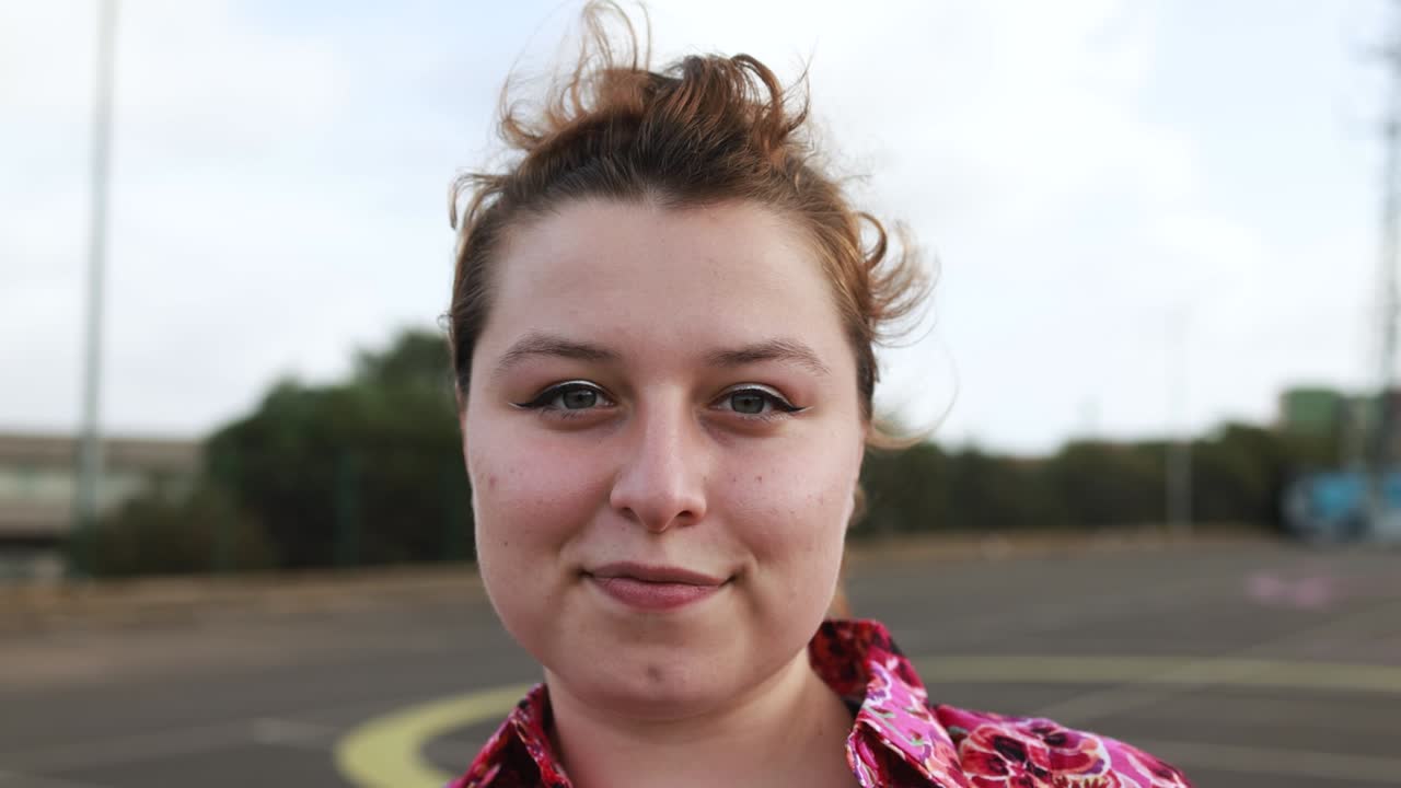 Young woman looking on camera