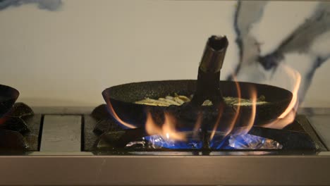 cooking fish on a gas stove