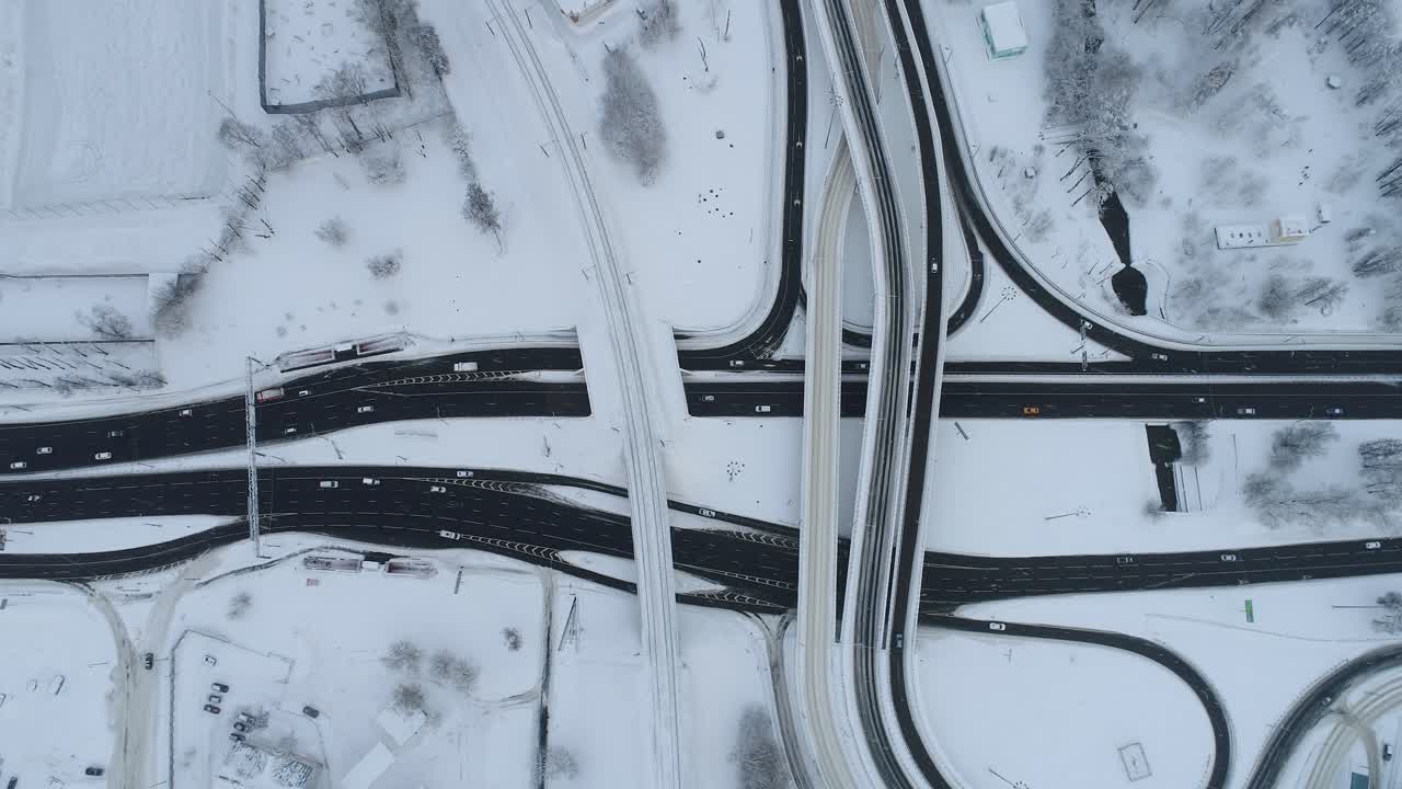 Aerial view of a freeway intersection Snow-covered in winter.