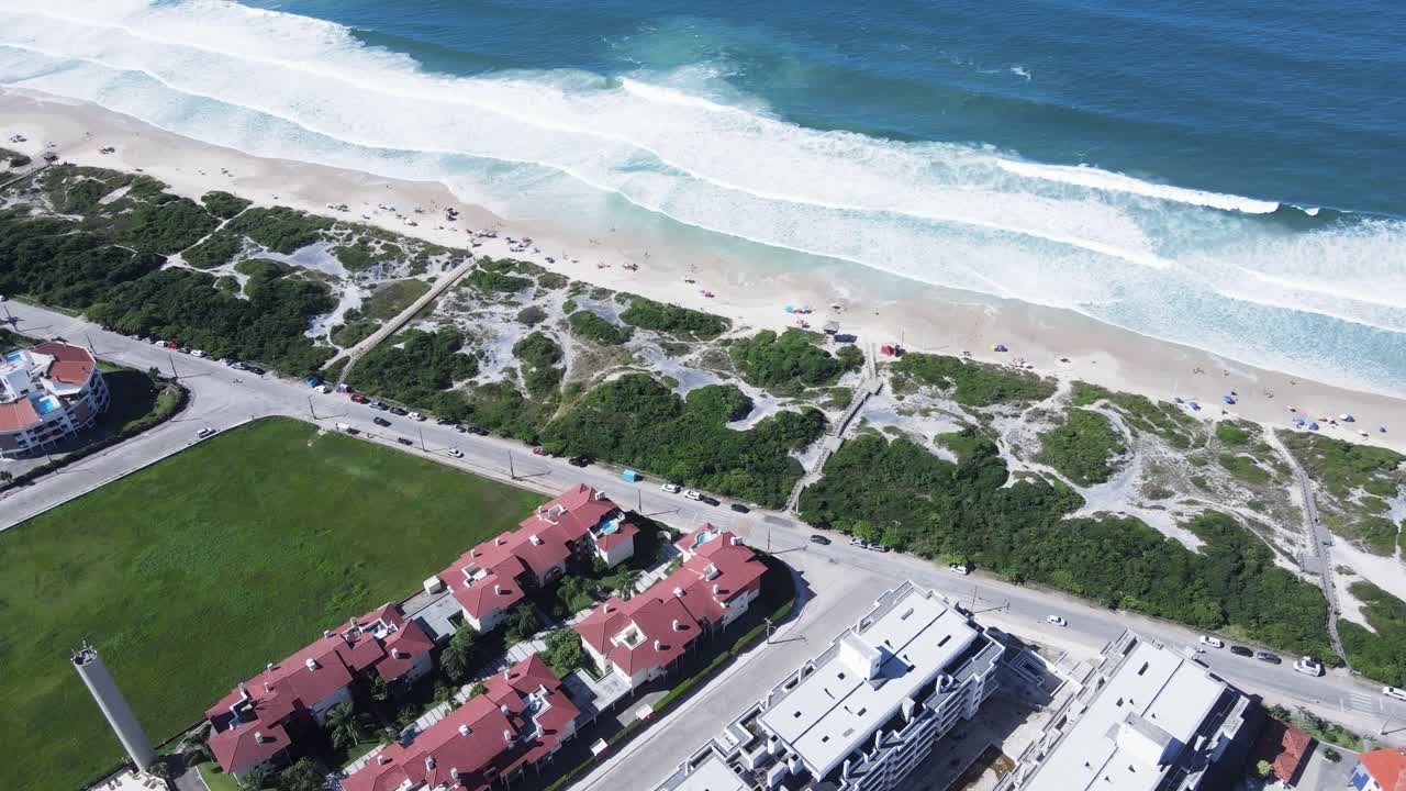 Panoramic aerial view of Ingleses beach in Florianópolis, Santa Catarina, Canto das Gaivotas, a complex of buildings facing the sea