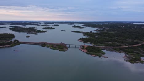 Aerial-view-of-Brando-Island-in-Aland-Islands,-Finland,-lowering-dolly-shot