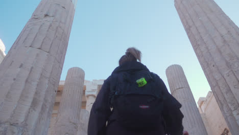 walking through ancient ruins in greece