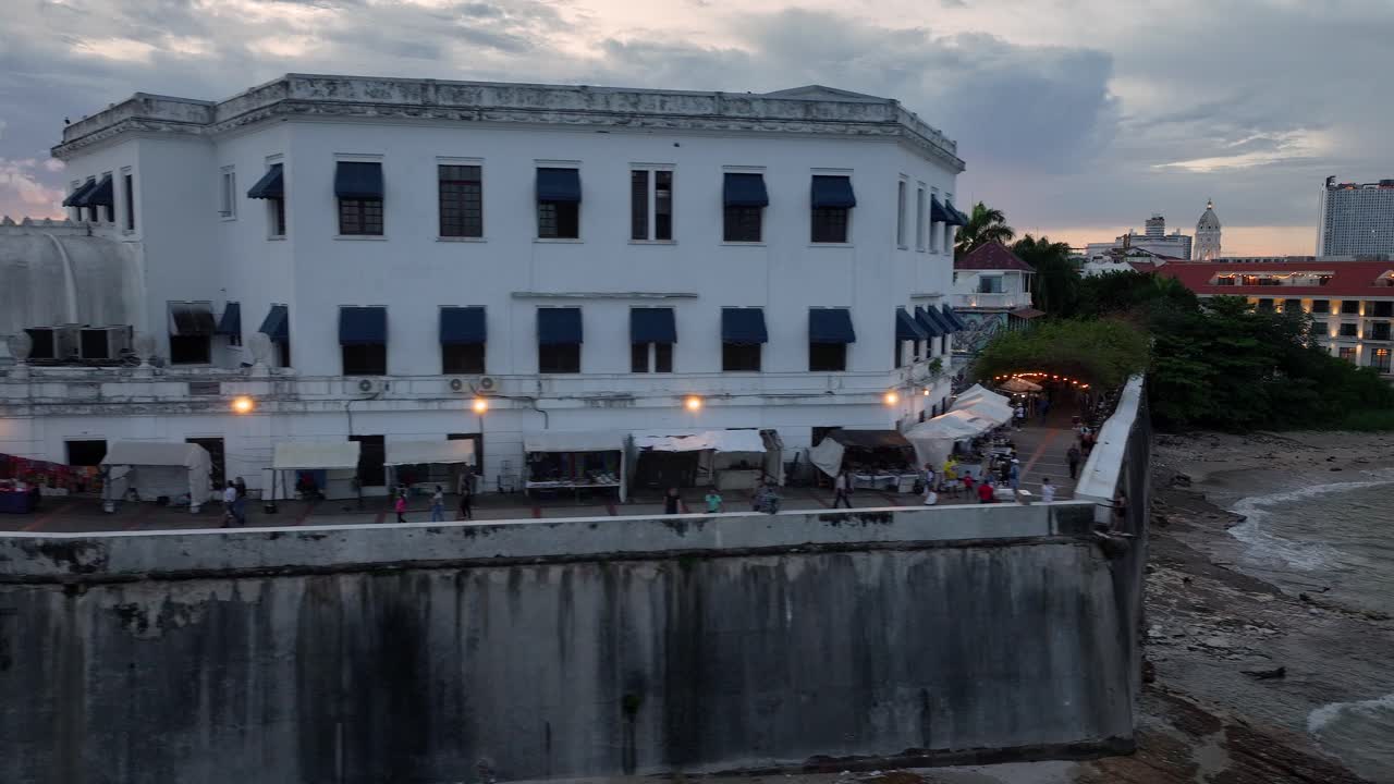 Drone shot of Las Bobedas in Panama rising up and revealing Ancon Hill